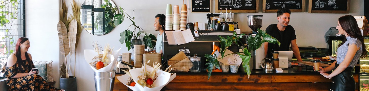 Little Nolla coffee shop with customers and staff